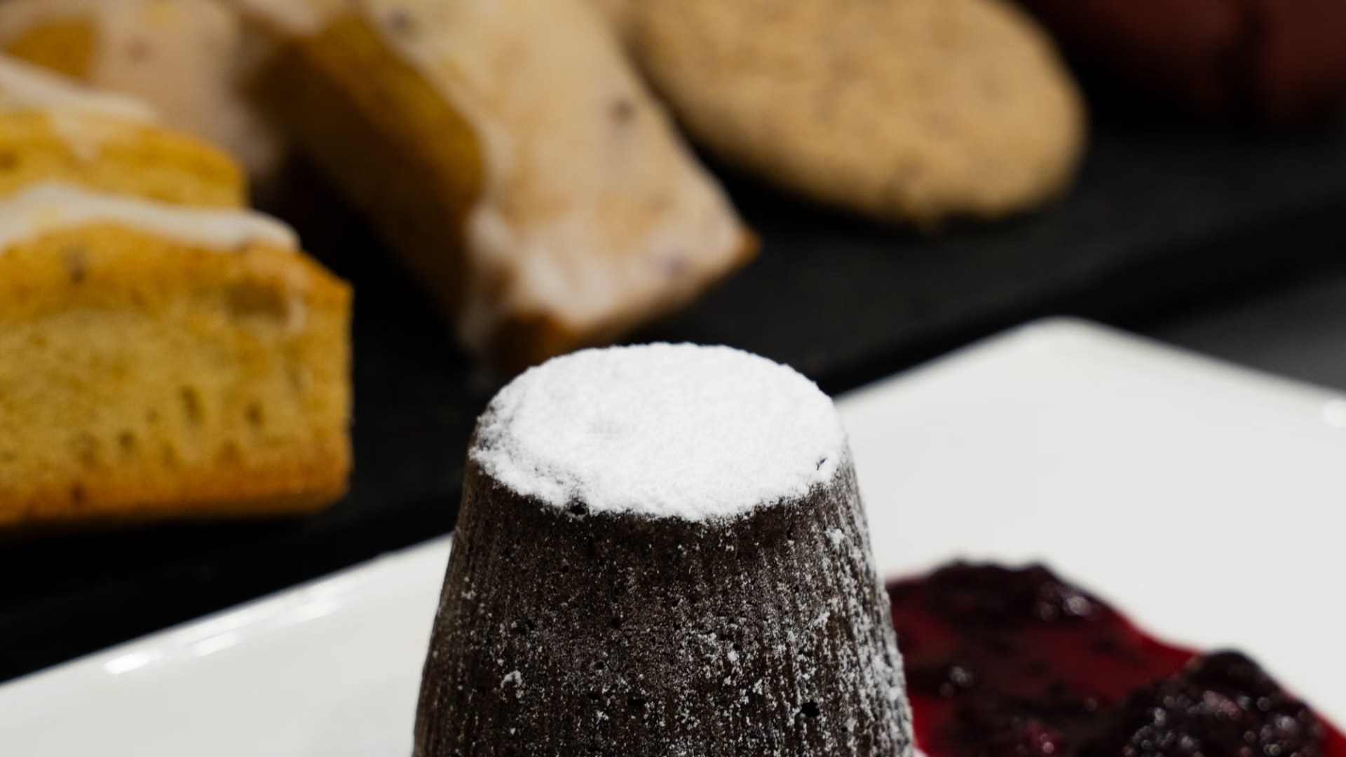 Assorted desserts including a chocolate lava cake. Photo by URI CHERNI on Pexels.