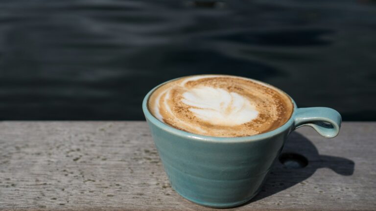 Unsplash photo by xyzcharlize showing a coffee latte in a mug