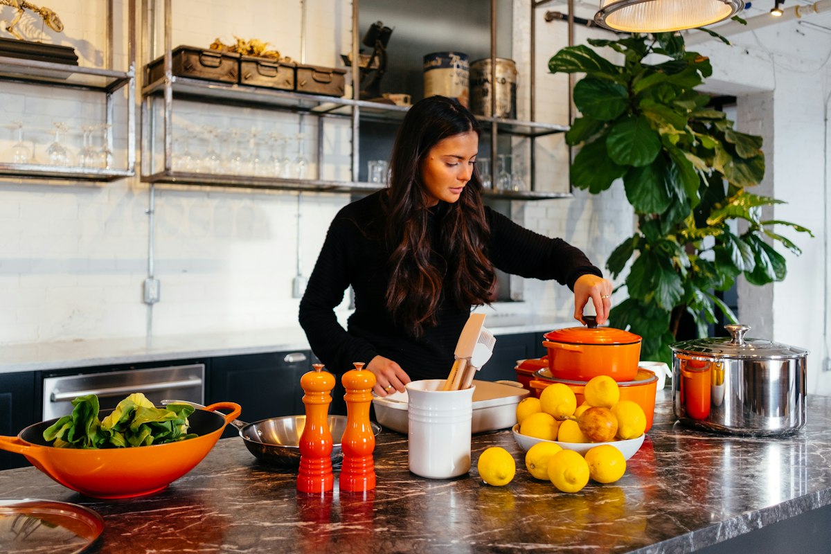 Woman cooking in her home kitchen