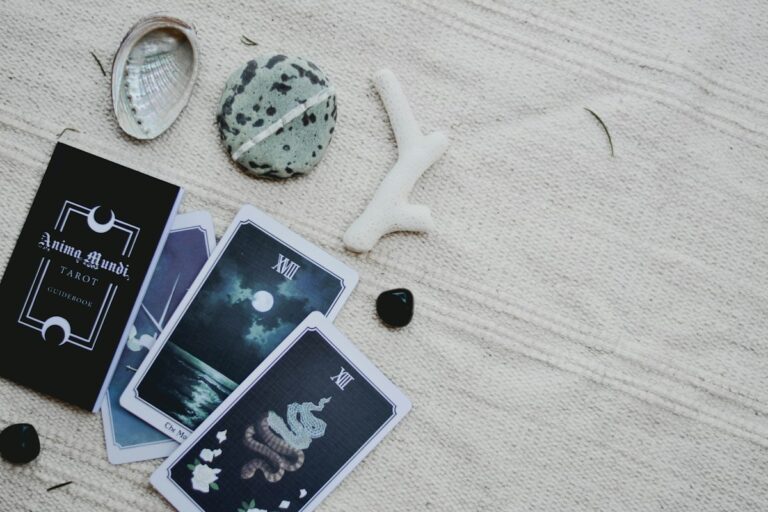 Tarot cards and astrology items flat lay